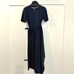 Long short sleeve dress in navy with white stripes. Comes with belt.